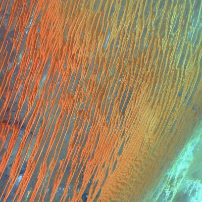 The surface of Mars, orange and blue lines on the ground, satellite photography, texture details, top view, closeup, high resolution